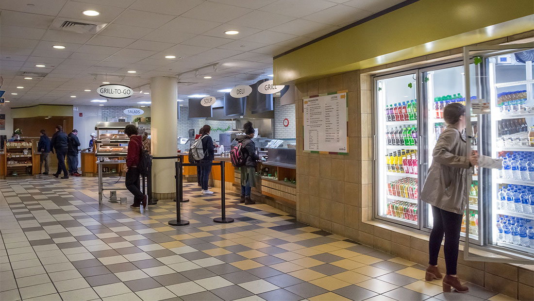 Students getting food in the cafe