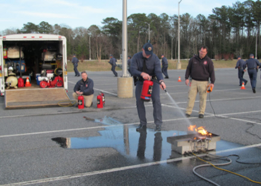 Academy training with fire extinguisher