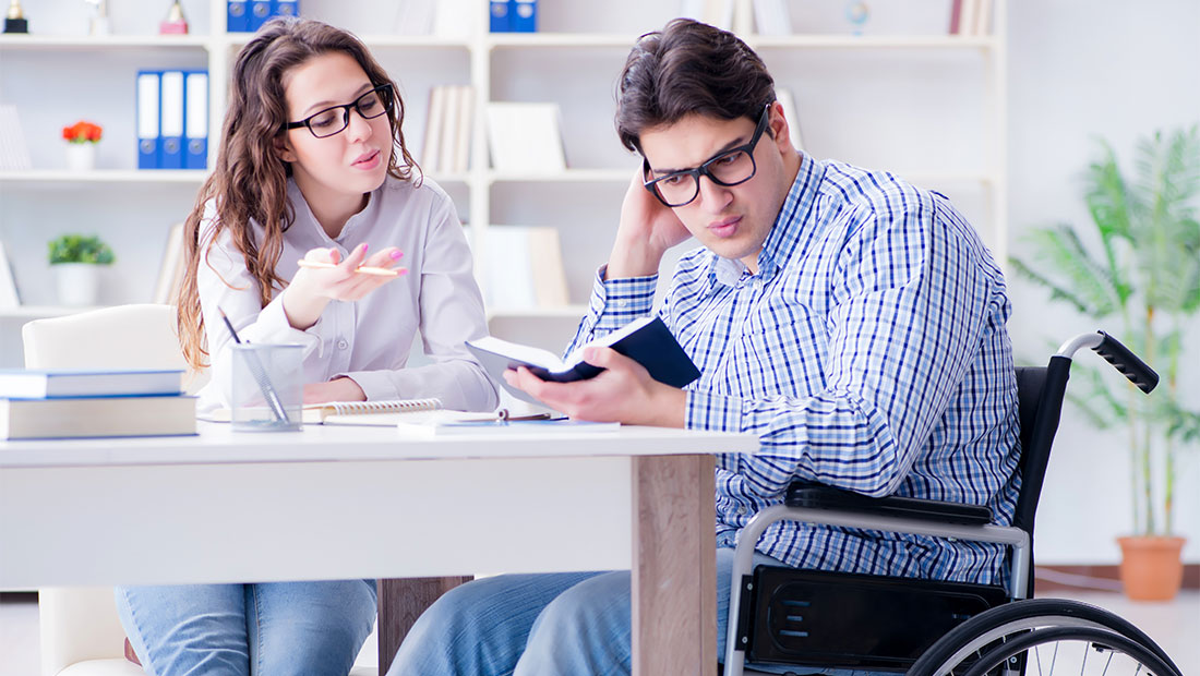 Man and Woman looking at book