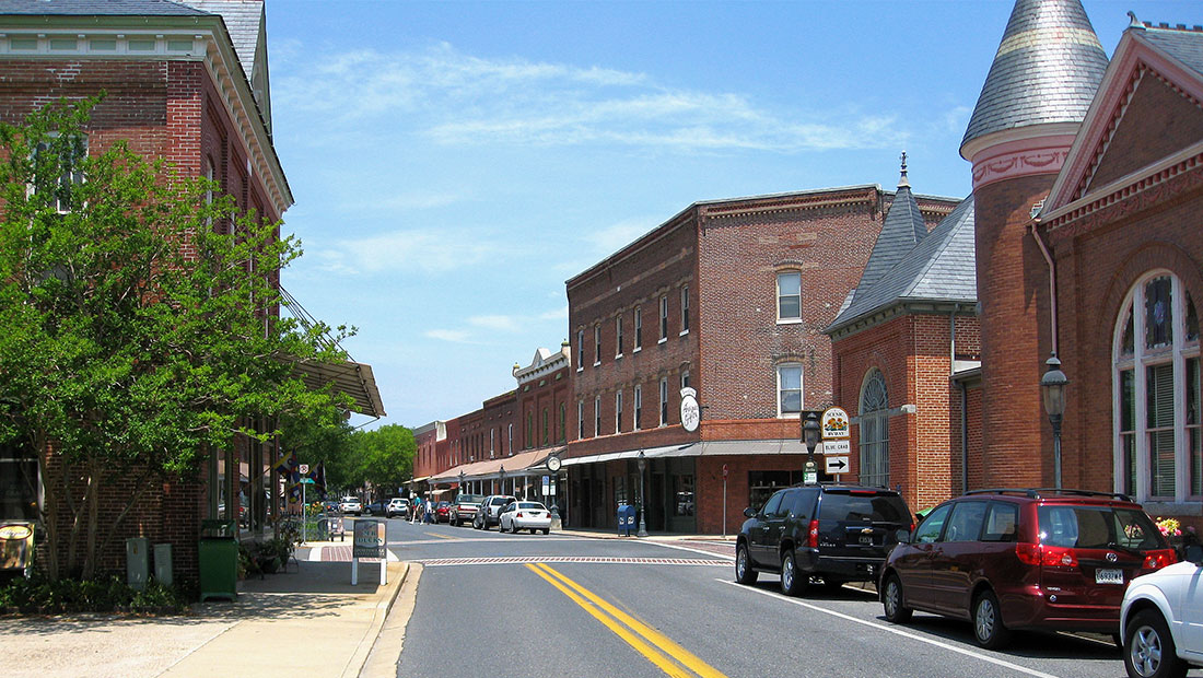 Street view of buildings with cars