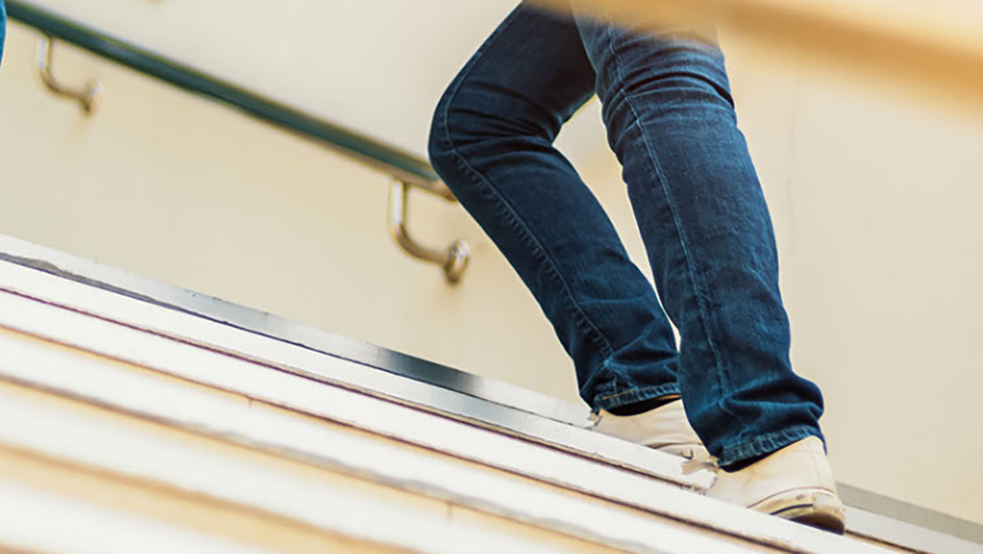 Legs walking up steps